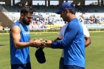 indian team camouflage caps, ms dhoni presented caps, india vs australia team india wear army caps as a mark of respect, Army caps