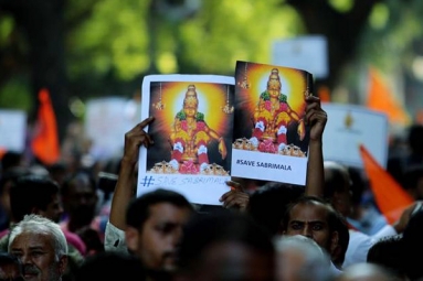 Sabarimala Row: Kerala Police Issue Warning to NRIs Inciting Riots Sabarimala Row: Kerala Police Issue Warning to NRIs Inciting Riots