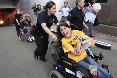 Denver Police arrest disabled protestors at Sen. Gardner&#039;s Office