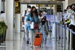 Quarantine Rules India breaking updates, Quarantine Rules India, india lifts quarantine rules for foreign returnees, Face masks
