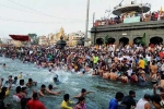 Indians in kumbh mela 2019, varanasi, kumbh mela 2019 indian diaspora takes dip in holy water at sangam, Pravasi bharatiya divas